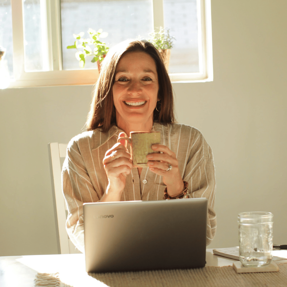 Belinda holding coffee