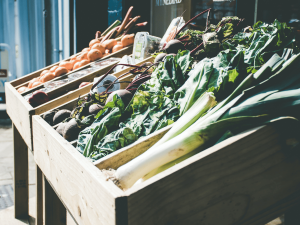 fresh produce on display at a farmers market